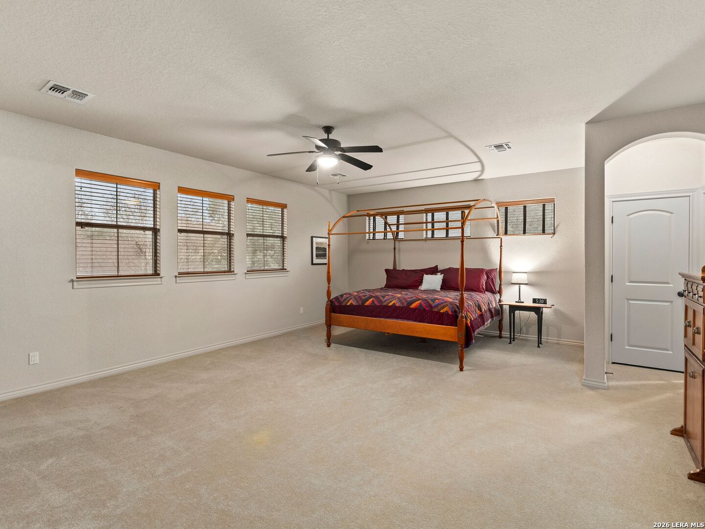19819 Wild Hollow Garden Ridge, TX 78266 - Photo 34 of 68 a living room with furniture and a window
