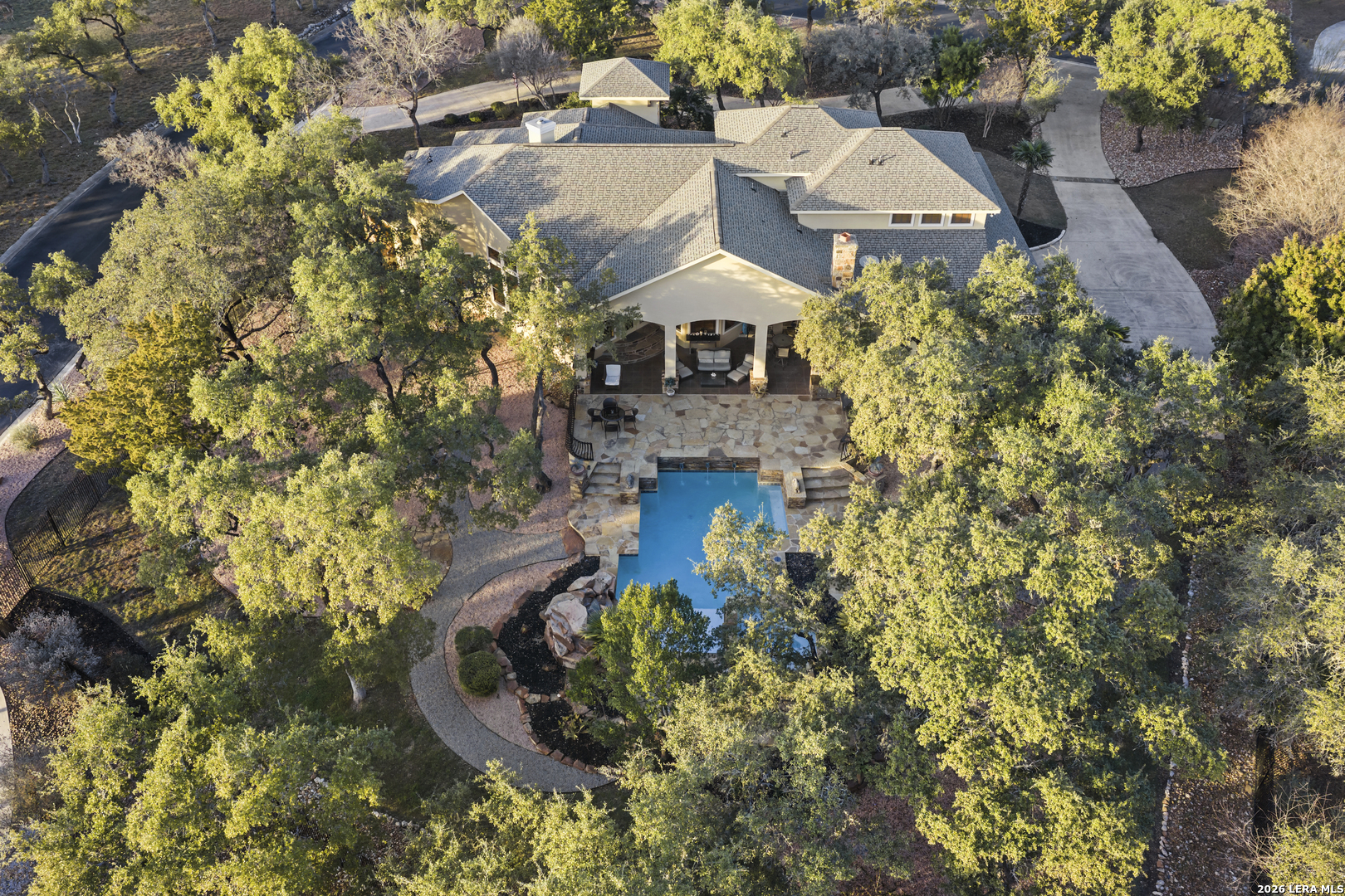 19819 Wild Hollow Garden Ridge, TX 78266 - Photo 5 of 68 an aerial view of a house with a yard