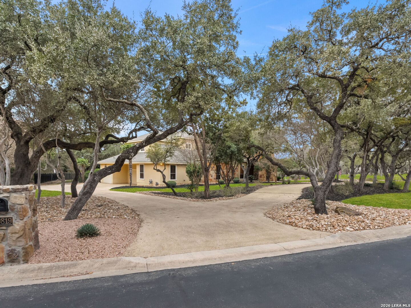 19819 Wild Hollow Garden Ridge, TX 78266 - Photo 54 of 68 a view of a yard with a fountain