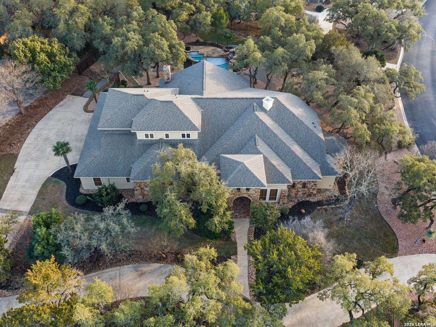 19819 Wild Hollow Garden Ridge, TX 78266 - Photo 61 of 68 an aerial view of a house with a yard