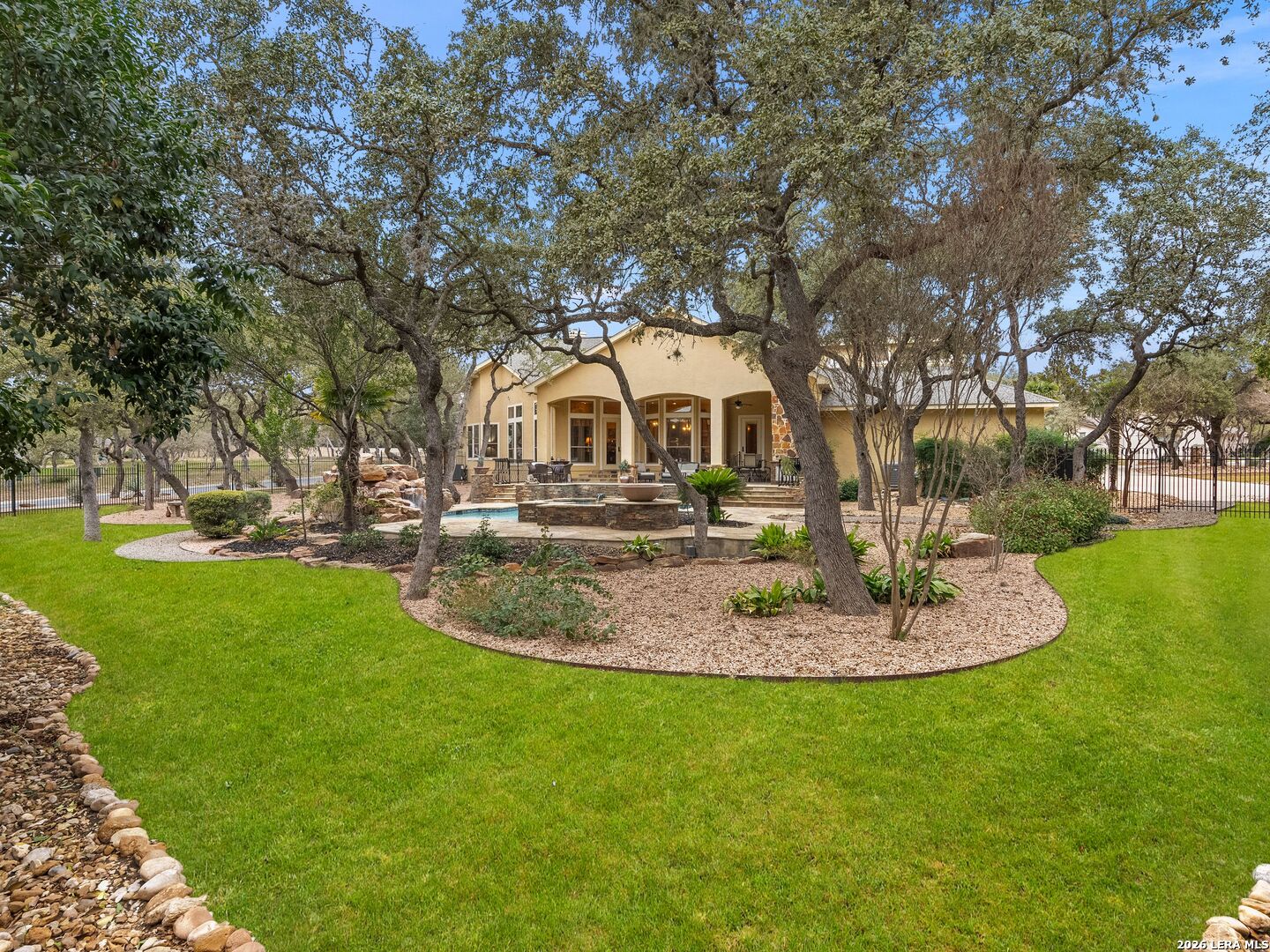 19819 Wild Hollow Garden Ridge, TX 78266 - Photo 8 of 68 a view of outdoor space yard and green space
