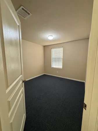 en empty room with windows