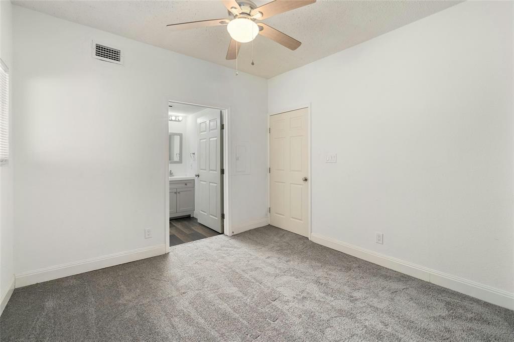 1910 Robbins Place, Unit 103 Austin, TX 78705 - Photo 11 of 16 Bedroom view looking towards the bathroom.