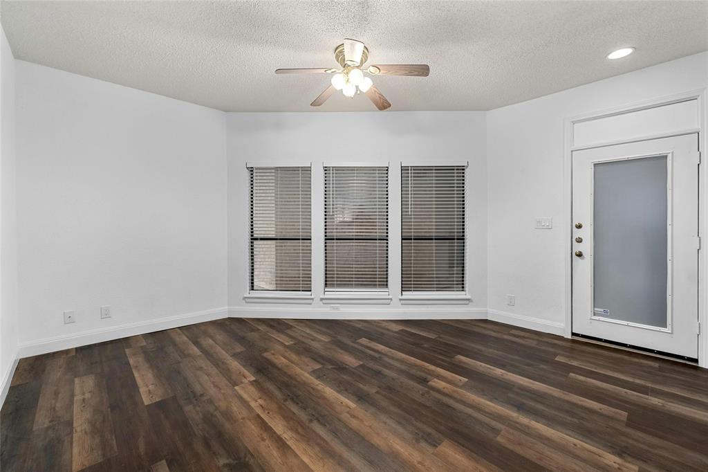 1910 Robbins Place, Unit 103 Austin, TX 78705 - Photo 2 of 16 Living room and front entryway