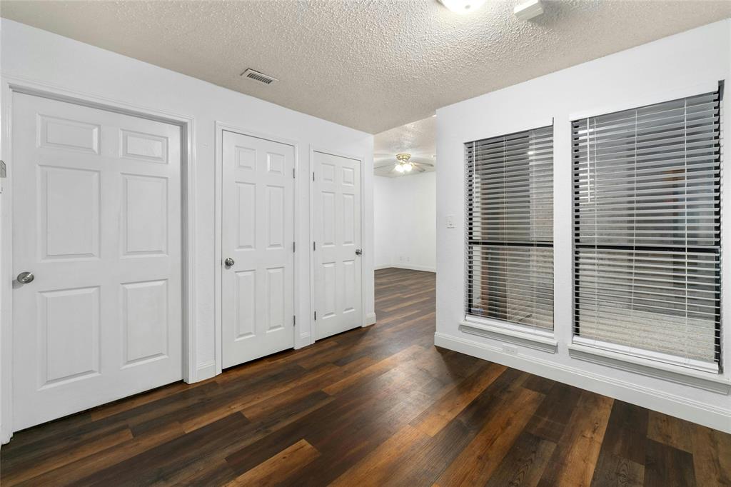 1910 Robbins Place, Unit 103 Austin, TX 78705 - Photo 7 of 16 Dining room showing access to the bedroom, laundry room and entry closet