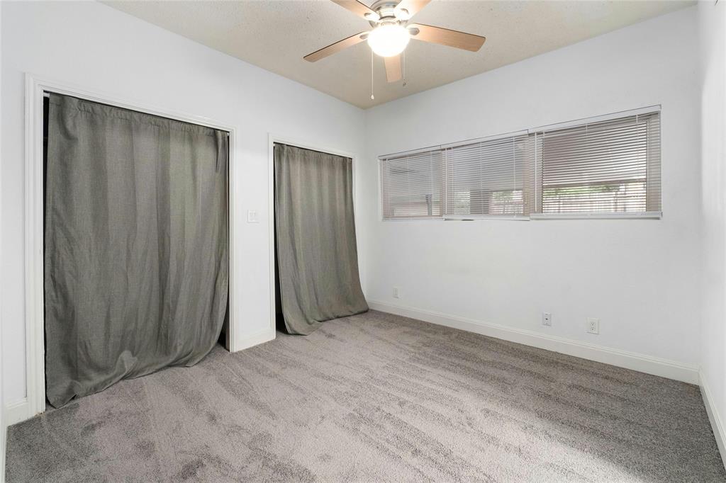1910 Robbins Place, Unit 103 Austin, TX 78705 - Photo 10 of 16 Bedroom with two closets