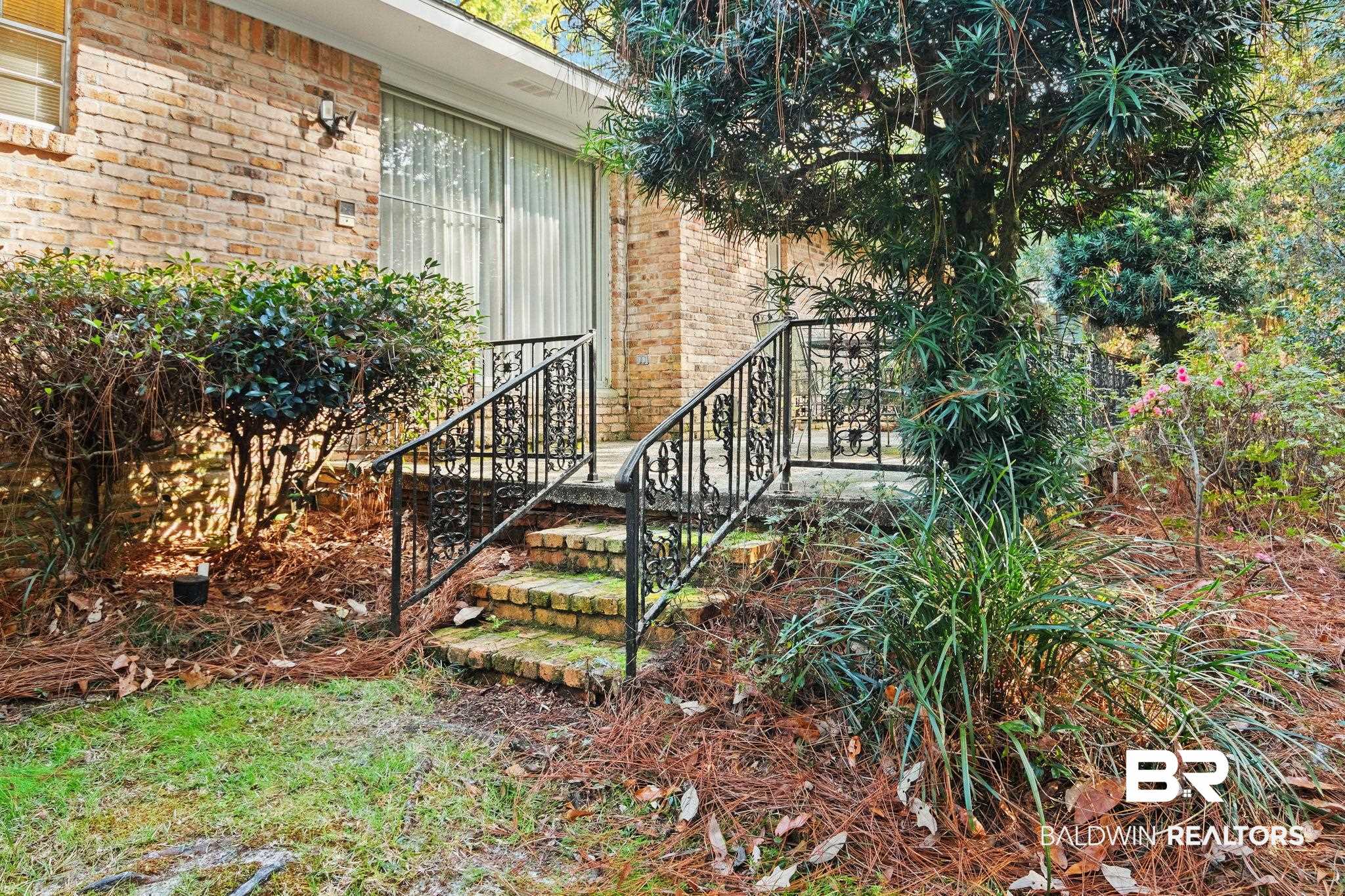 752 Evergreen Street Fairhope, AL 36532 - Photo 62 of 100 Property entrance with brick siding