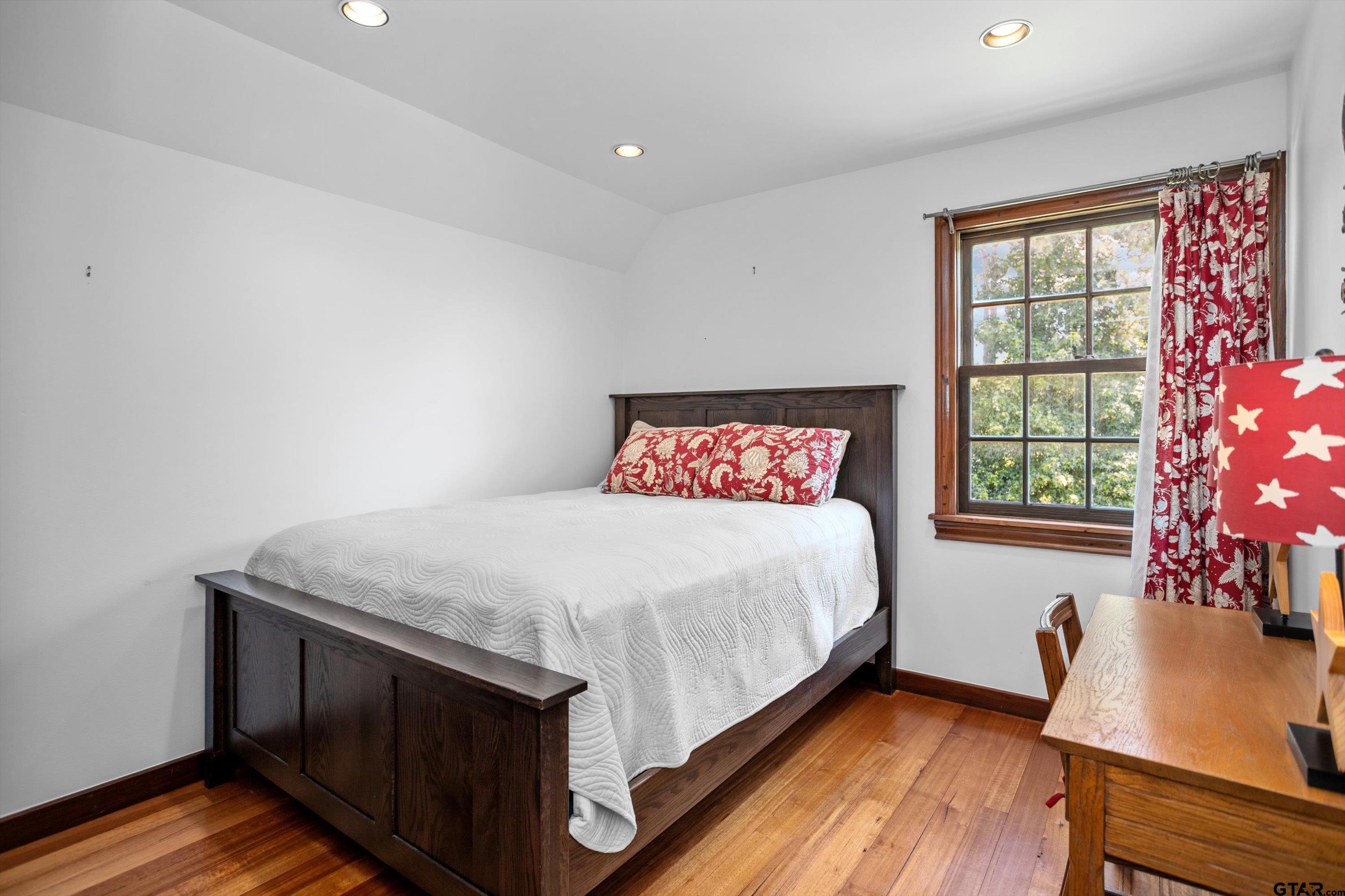 656 Vineyard View Ranch Grapeland, TX 75844 - Photo 25 of 31 a bedroom with a bed and a window