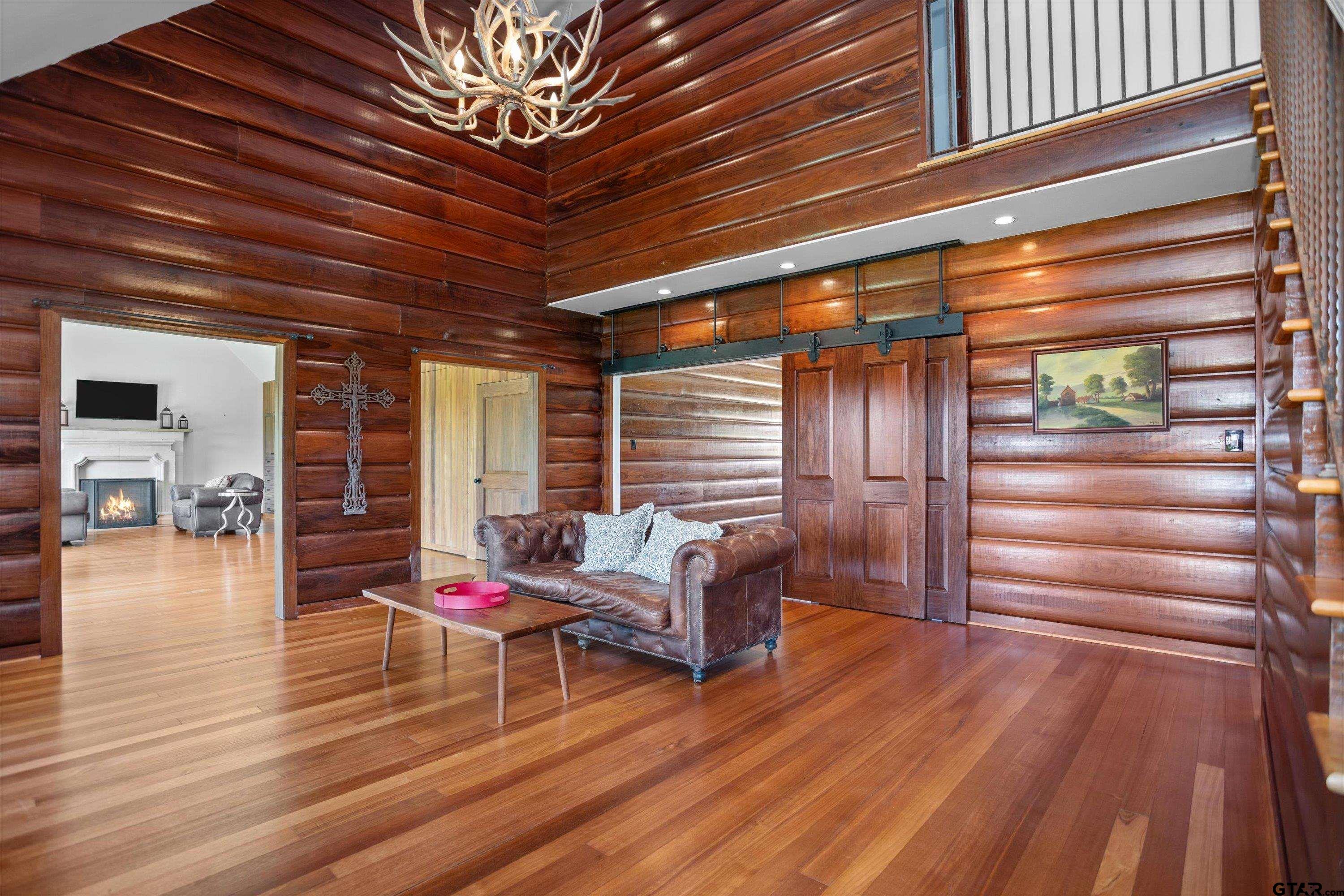 656 Vineyard View Ranch Grapeland, TX 75844 - Photo 7 of 31 a living room with furniture and wooden floors