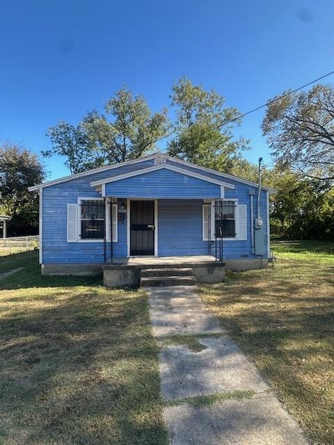 2340 Macon Street Dallas, TX 75215 - Photo 2 of 30 a view of a house with a yard