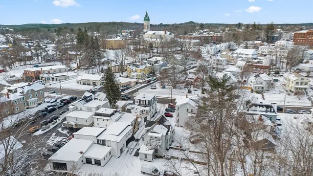 a view of a brick building with many windows