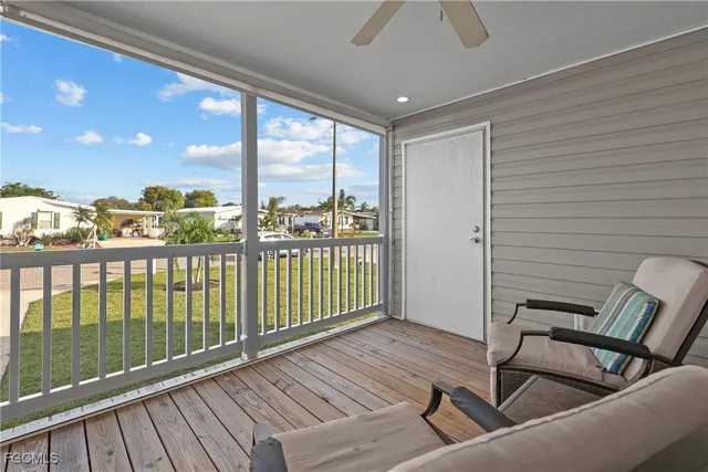 a view of balcony with furniture