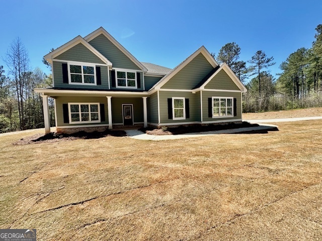 719 Polk Road Moreland, GA 30259 - Photo 1 of 1 front view of a house with a yard