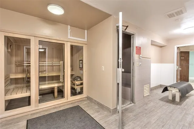 a room with furniture and pool table