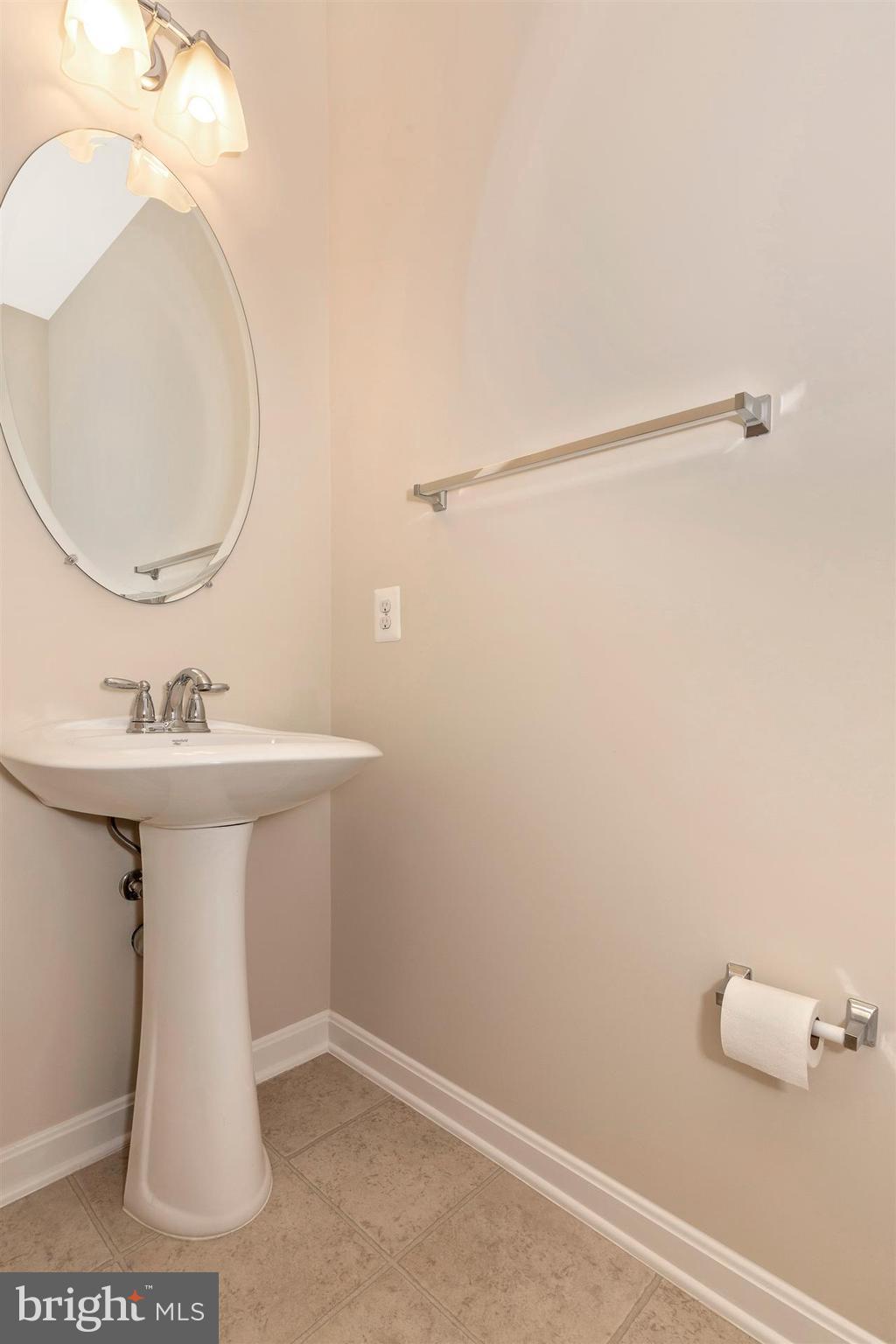1832 Monocacy View Circle Frederick, MD 21701 - Photo 14 of 30 a bathroom with a sink a mirror and vanity
