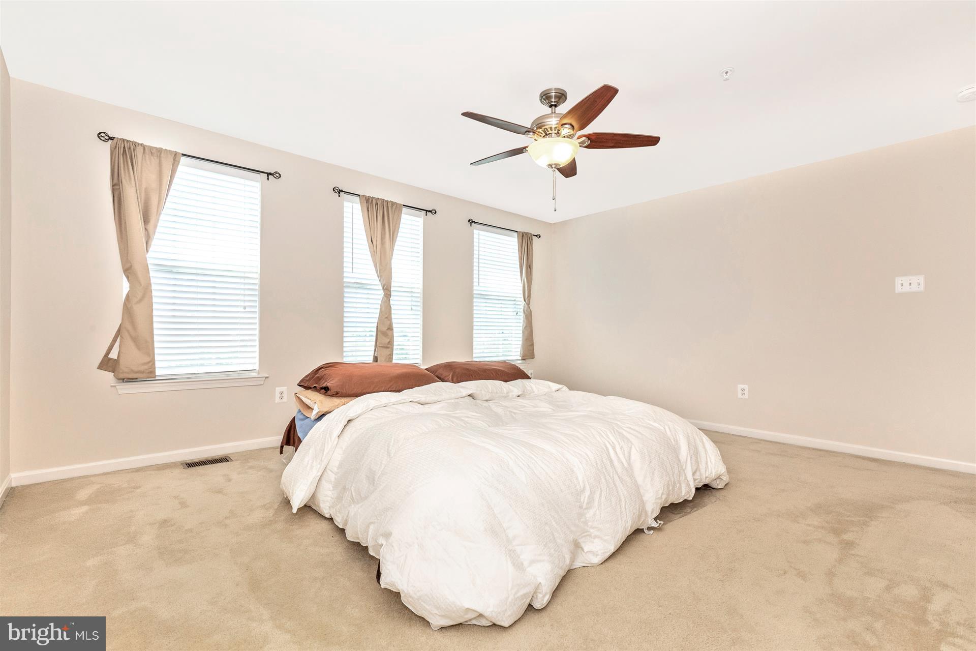 1832 Monocacy View Circle Frederick, MD 21701 - Photo 16 of 30 a bedroom with a bed and window