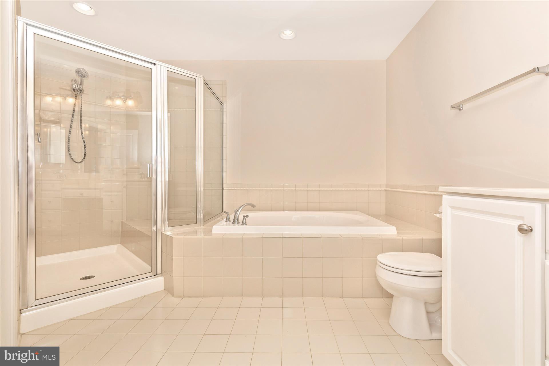 1832 Monocacy View Circle Frederick, MD 21701 - Photo 18 of 30 a bathroom with a bathtub and a toilet