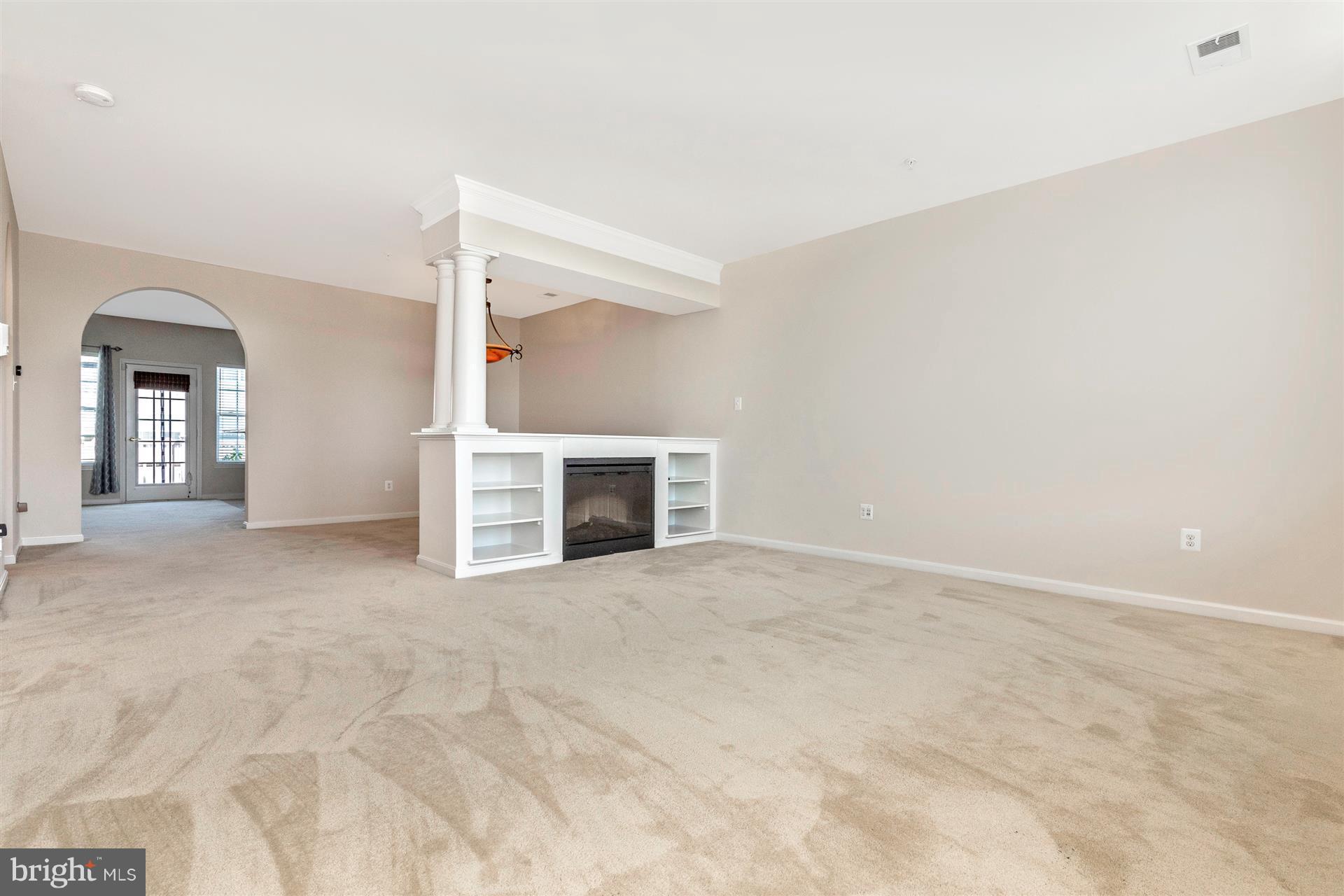 1832 Monocacy View Circle Frederick, MD 21701 - Photo 3 of 30 a view of an empty room with a fireplace and a window