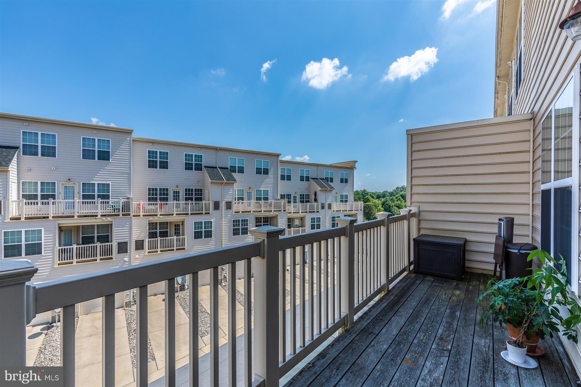 1832 Monocacy View Circle Frederick, MD 21701 - Photo 24 of 30 a view of a balcony with a potted plant