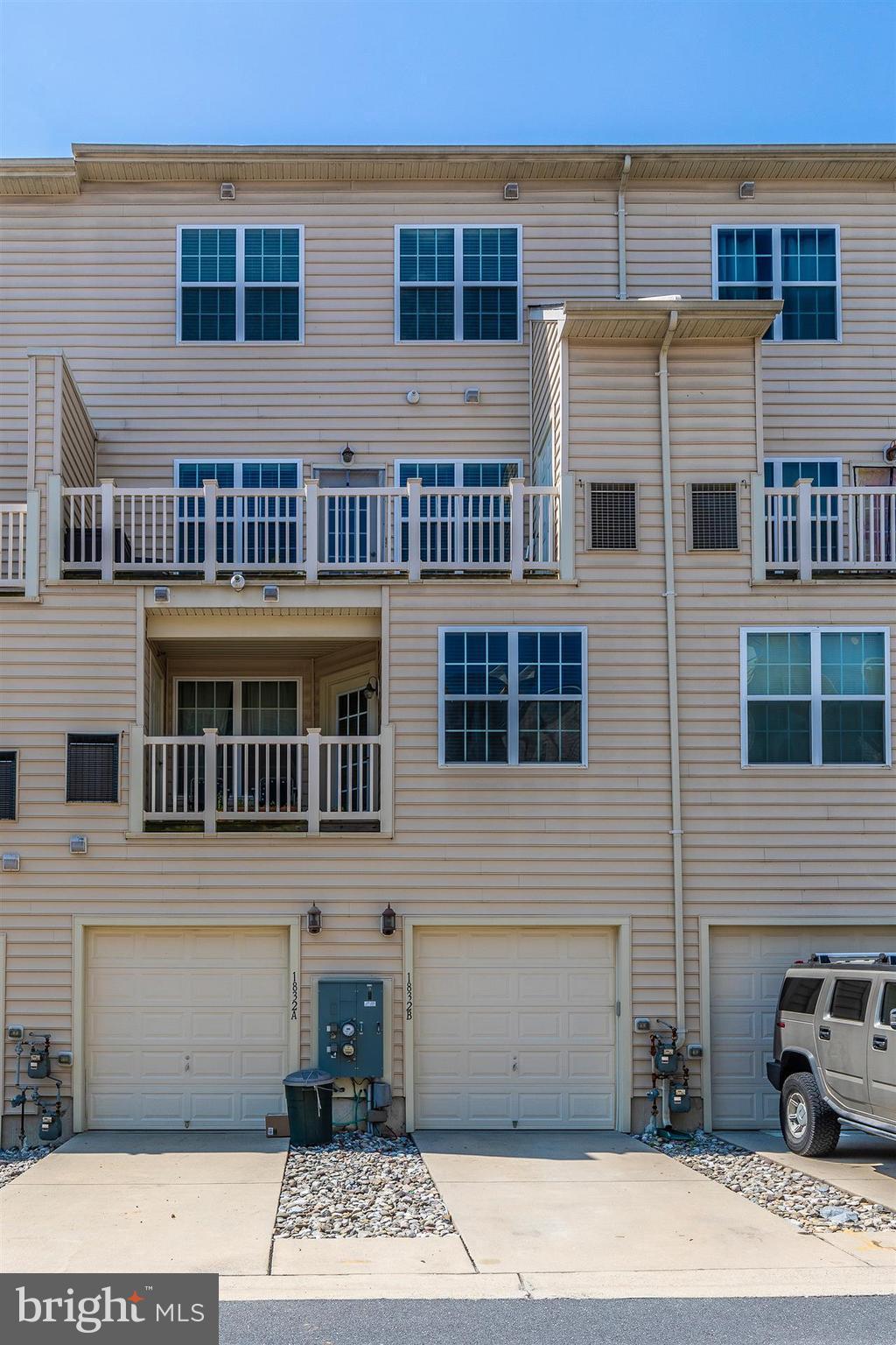 1832 Monocacy View Circle Frederick, MD 21701 - Photo 26 of 30 a front view of a building with a yard