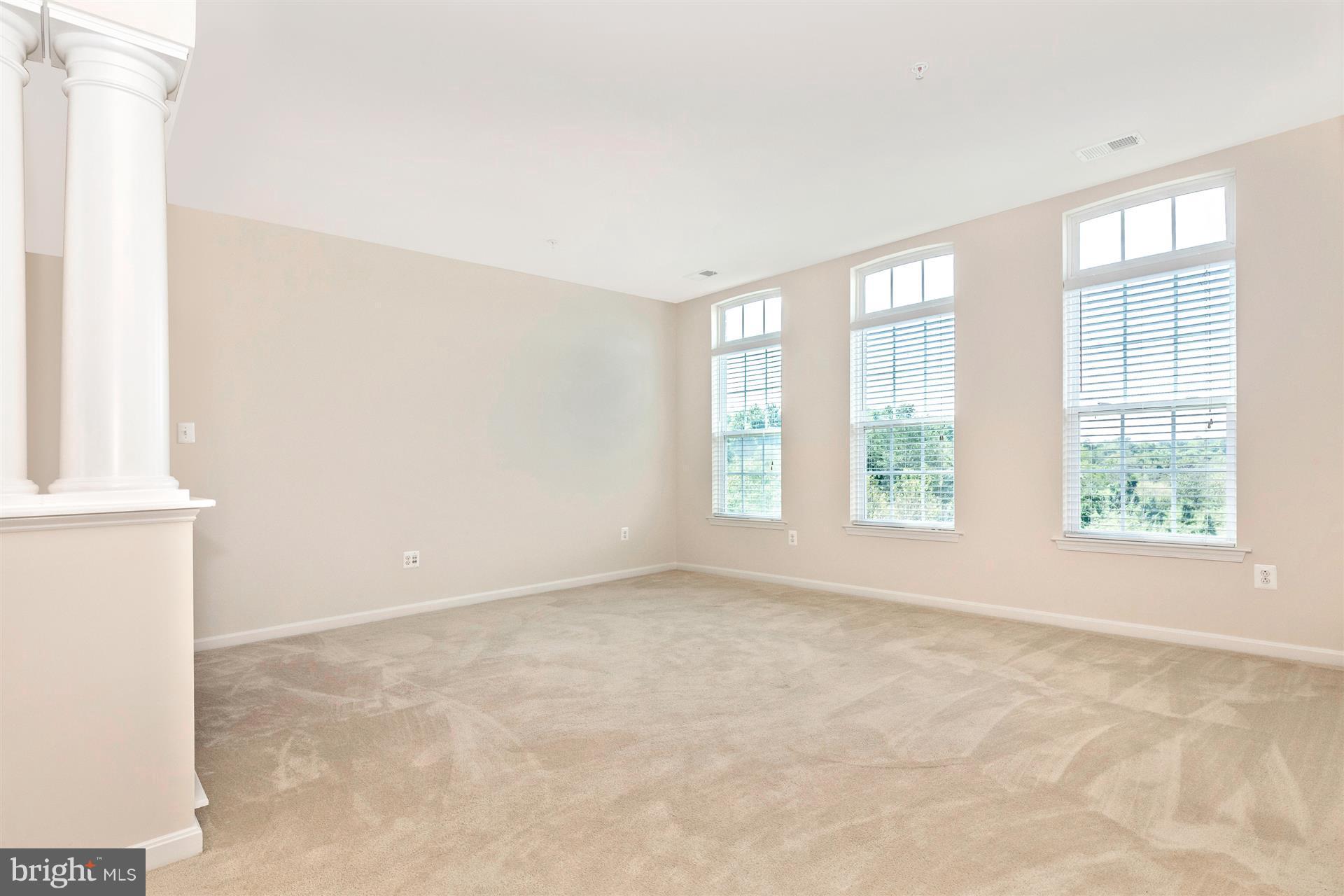 1832 Monocacy View Circle Frederick, MD 21701 - Photo 4 of 30 an empty room with windows