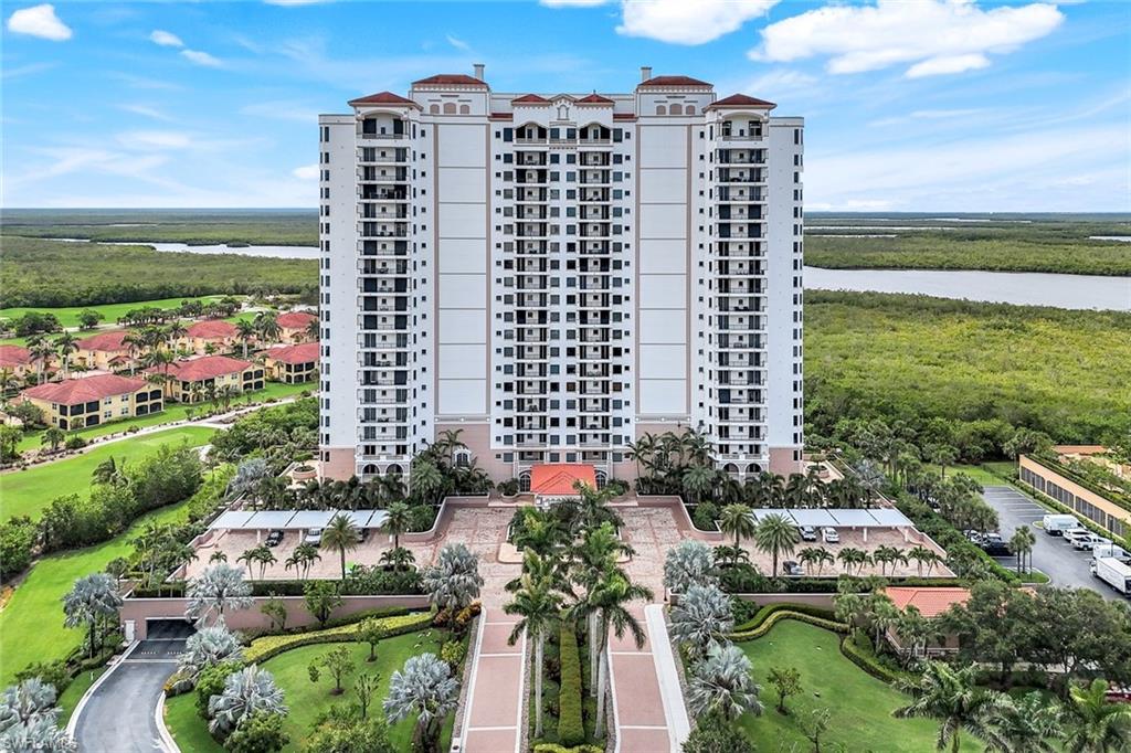 1060 Borghese Lane, Unit 1005 Naples, FL 34114 - Photo 23 of 38 a view of a city with tall buildings