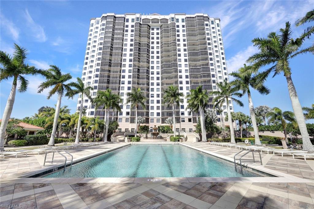 1060 Borghese Lane, Unit 1005 Naples, FL 34114 - Photo 30 of 38 a view of outdoor space yard and tall buildings