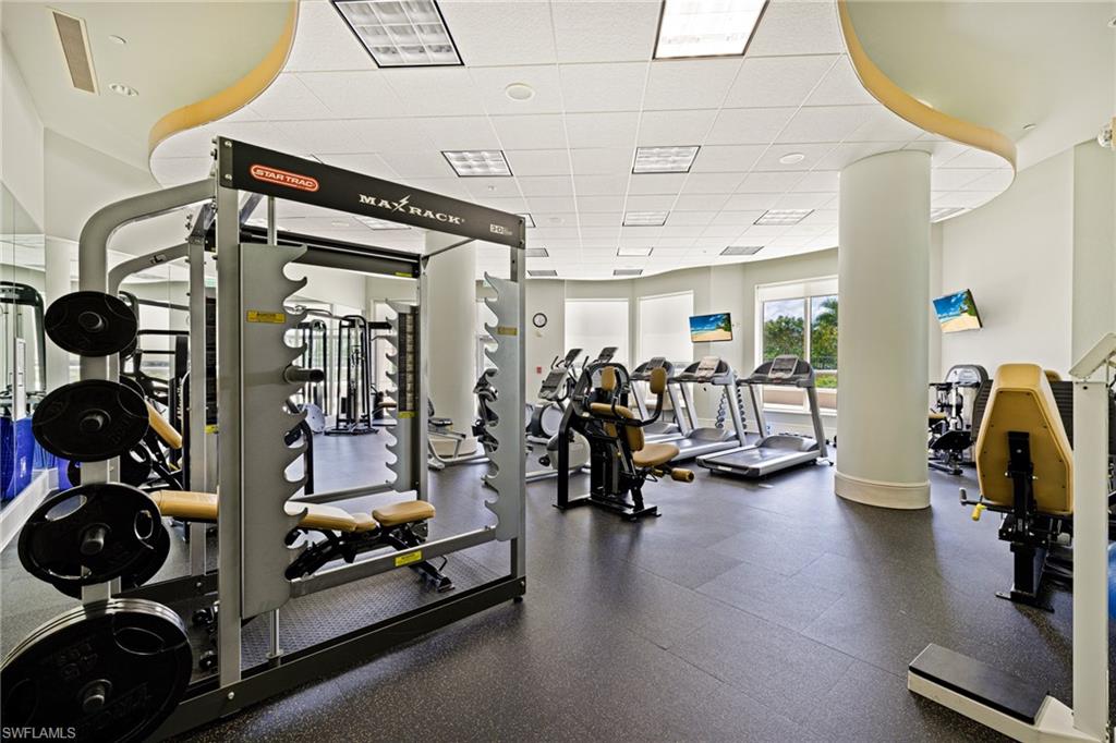 1060 Borghese Lane, Unit 1005 Naples, FL 34114 - Photo 32 of 38 a view of a room with gym equipment