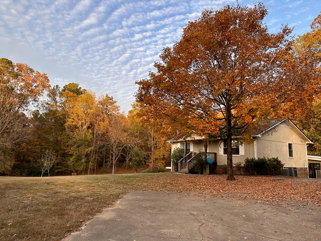 482 Old Bells Ferry Road Northeast Rome, GA 30161 - Photo 1 of 1 a front view of a house with a yard and garage