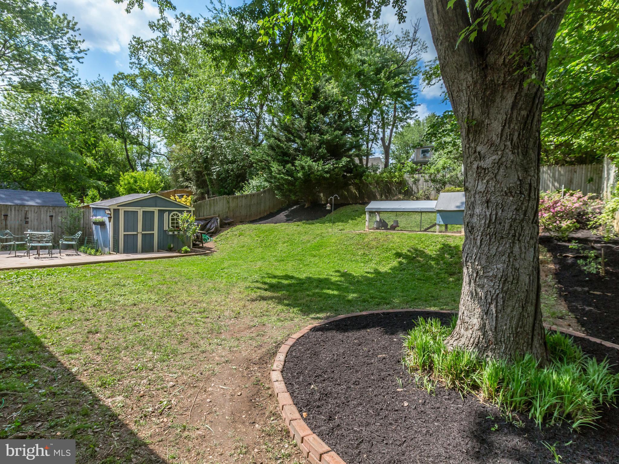 913 Robin Road Silver Spring, MD 20901 - Photo 25 of 30 Spacious privacy fenced backyard with brick patio