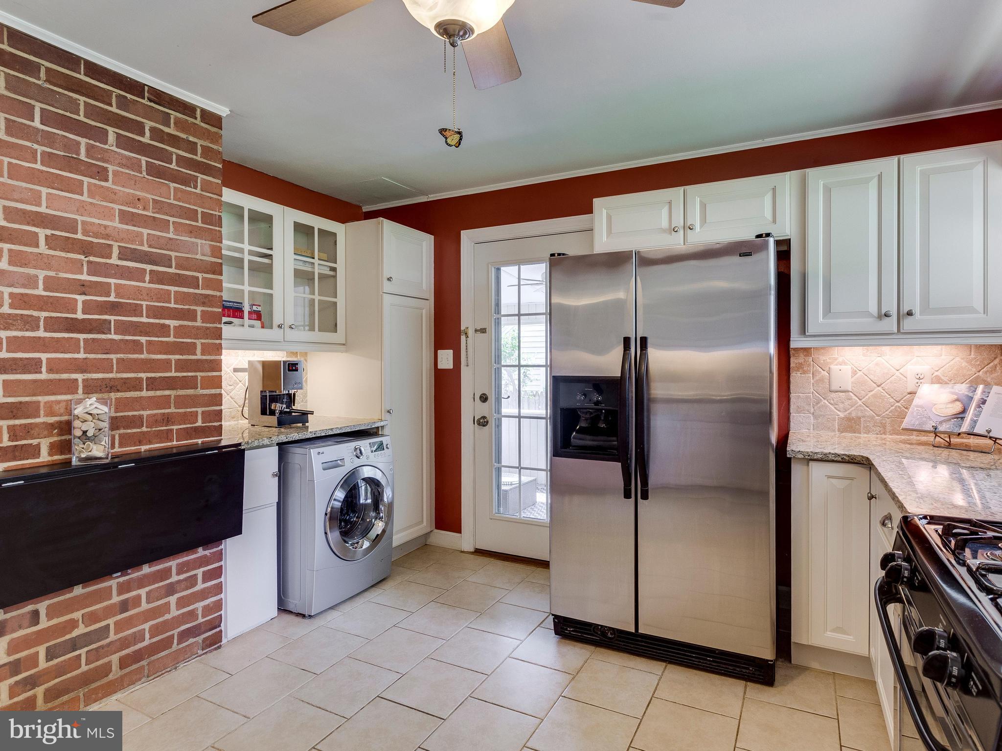913 Robin Road Silver Spring, MD 20901 - Photo 7 of 30 Original brick wall
