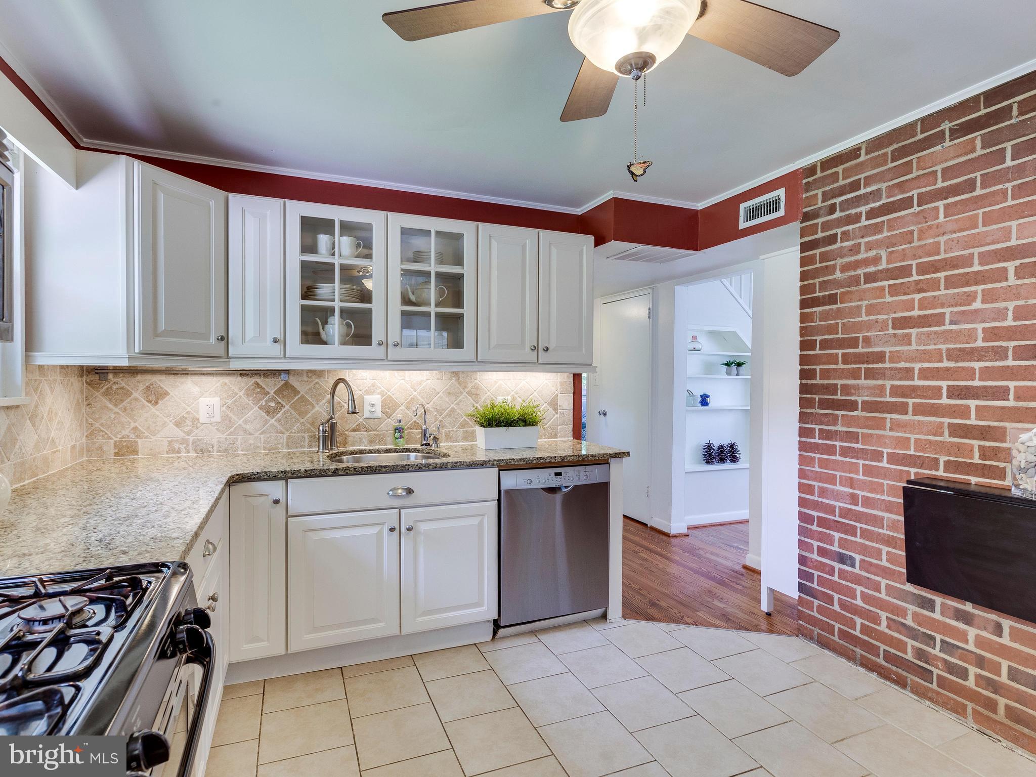 913 Robin Road Silver Spring, MD 20901 - Photo 8 of 30 Stainless appliances including gas range