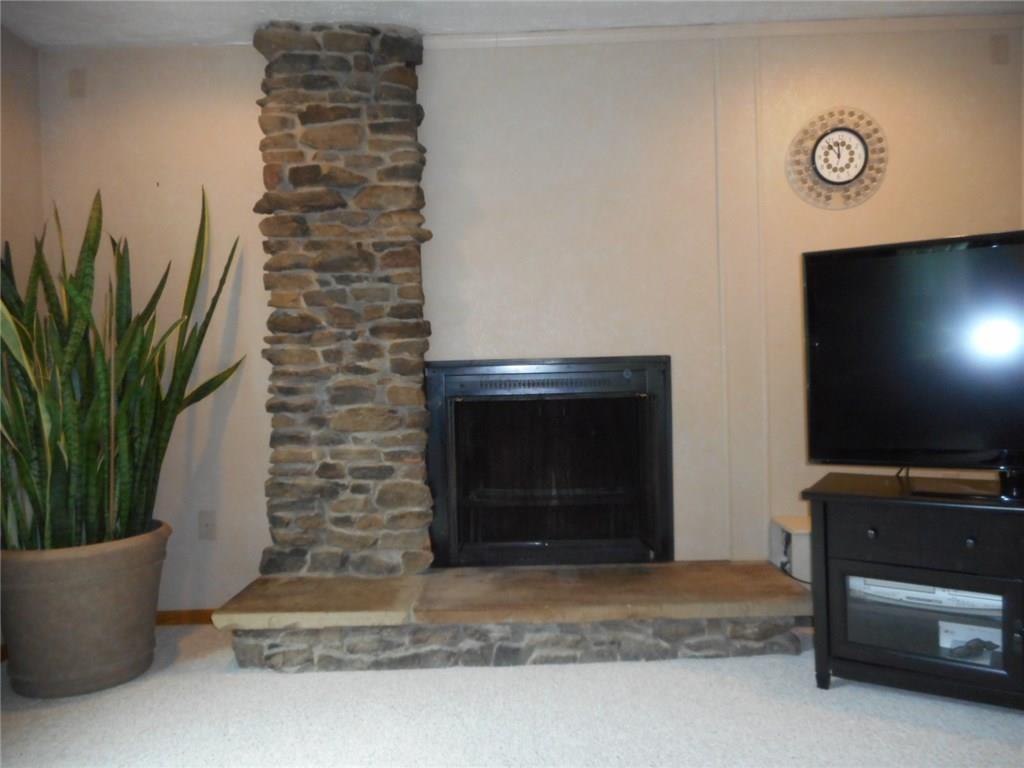 182 Adamson Road Marianna, PA 15345 - Photo 5 of 24 STONE FIREPLACE AND GAS LOGS