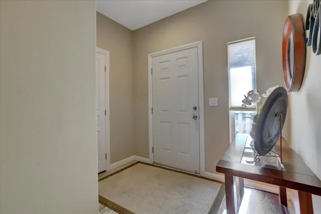 a view of room with window and bathroom