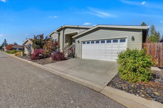 a front view of a house with natural light