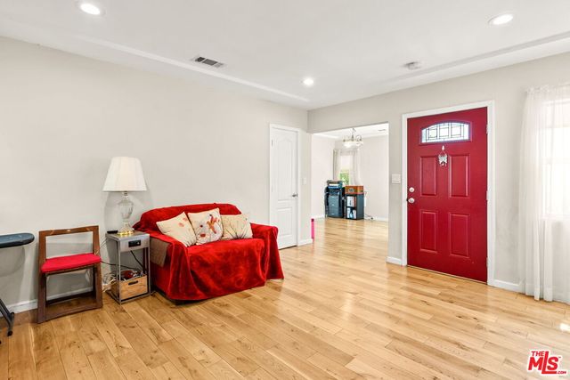 a bedroom with a bed and a closet