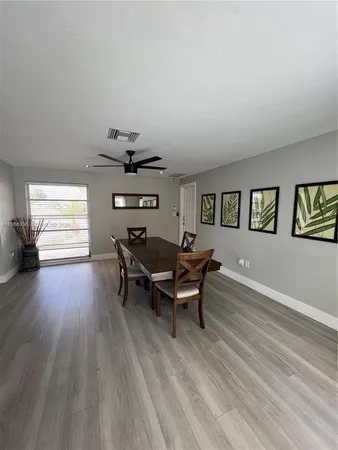 a bedroom with bed and window