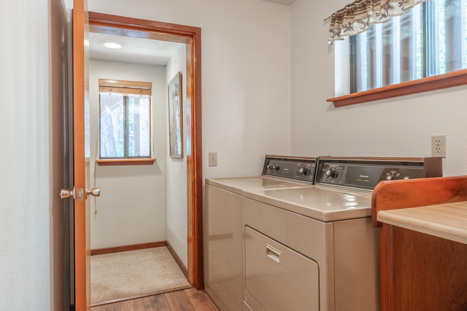 2281 Old Mammoth Road Mammoth Lakes, CA 93546 - Photo 13 of 27 Washroom with wood finished floors and washing machine and clothes dryer