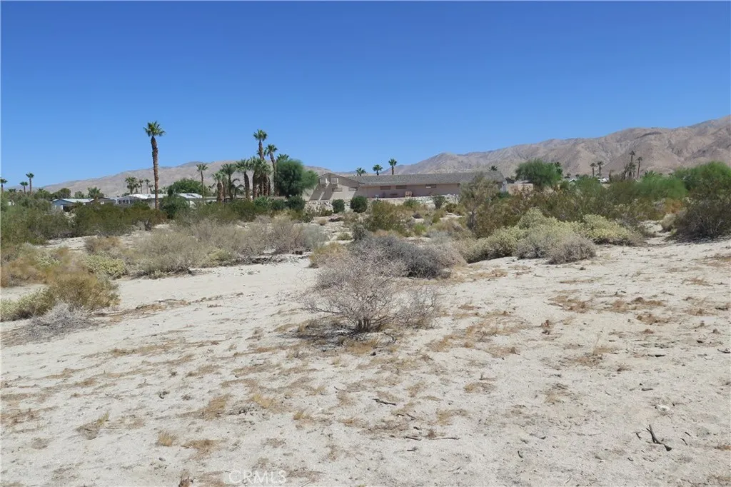 0 Aurora Road Riverside, CA 92504 - Photo 17 of 27 a view of a dry yard with mountains in the background