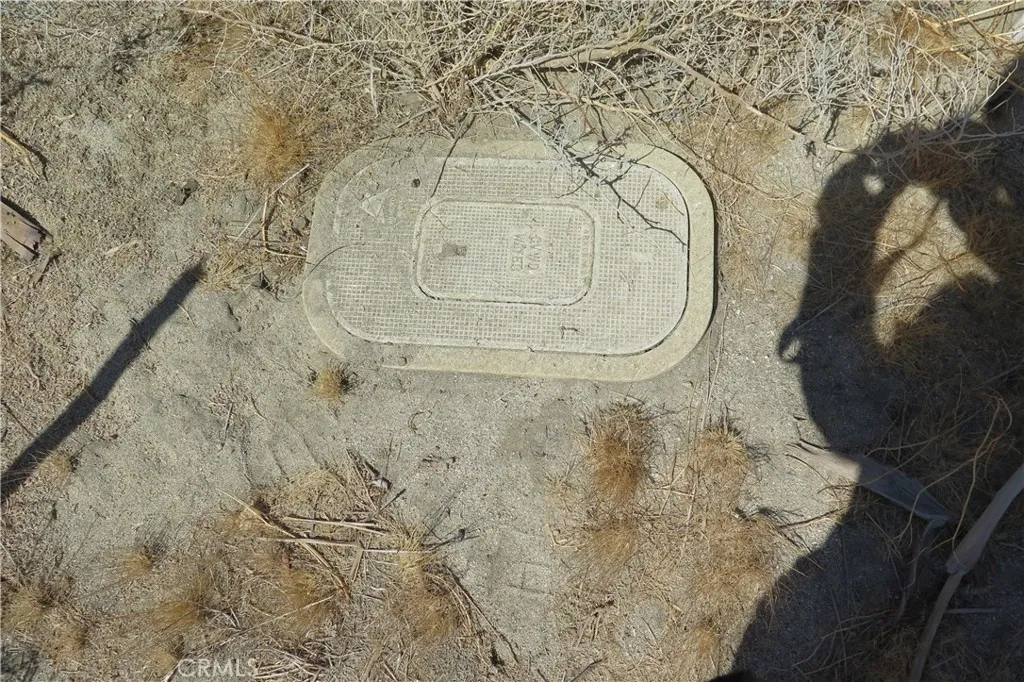 0 Aurora Road Riverside, CA 92504 - Photo 10 of 27 a bathroom with a granite countertop sink and a mirror