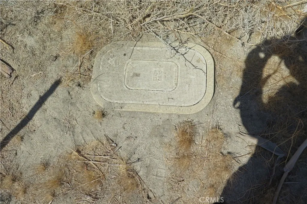 0 Aurora Road Riverside, CA 92504 - Photo 10 of 27 a bathroom with a granite countertop sink and a mirror