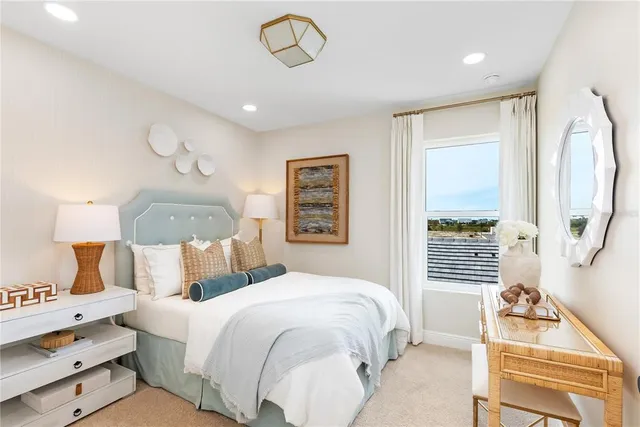 a bedroom with bed and a window