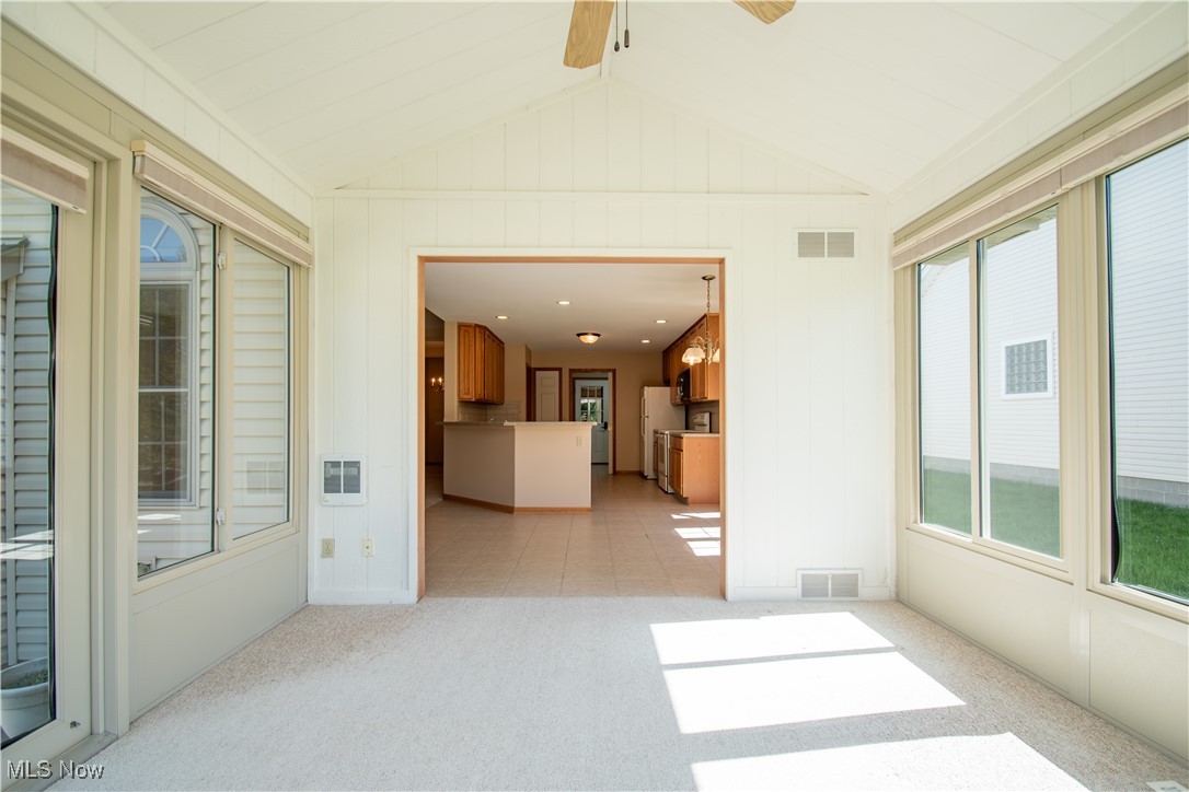 7007 Clingan Road, Unit 64 Youngstown, OH 44514 - Photo 26 of 50 Sunroom off kitchen.