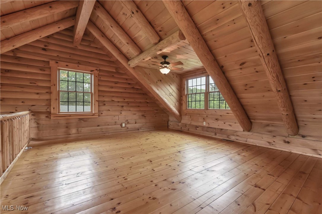 8164 Vandemark Road Lodi, OH 44254 - Photo 20 of 50 Second floor loft, vaulted ceiling, exposed beams and wood floor