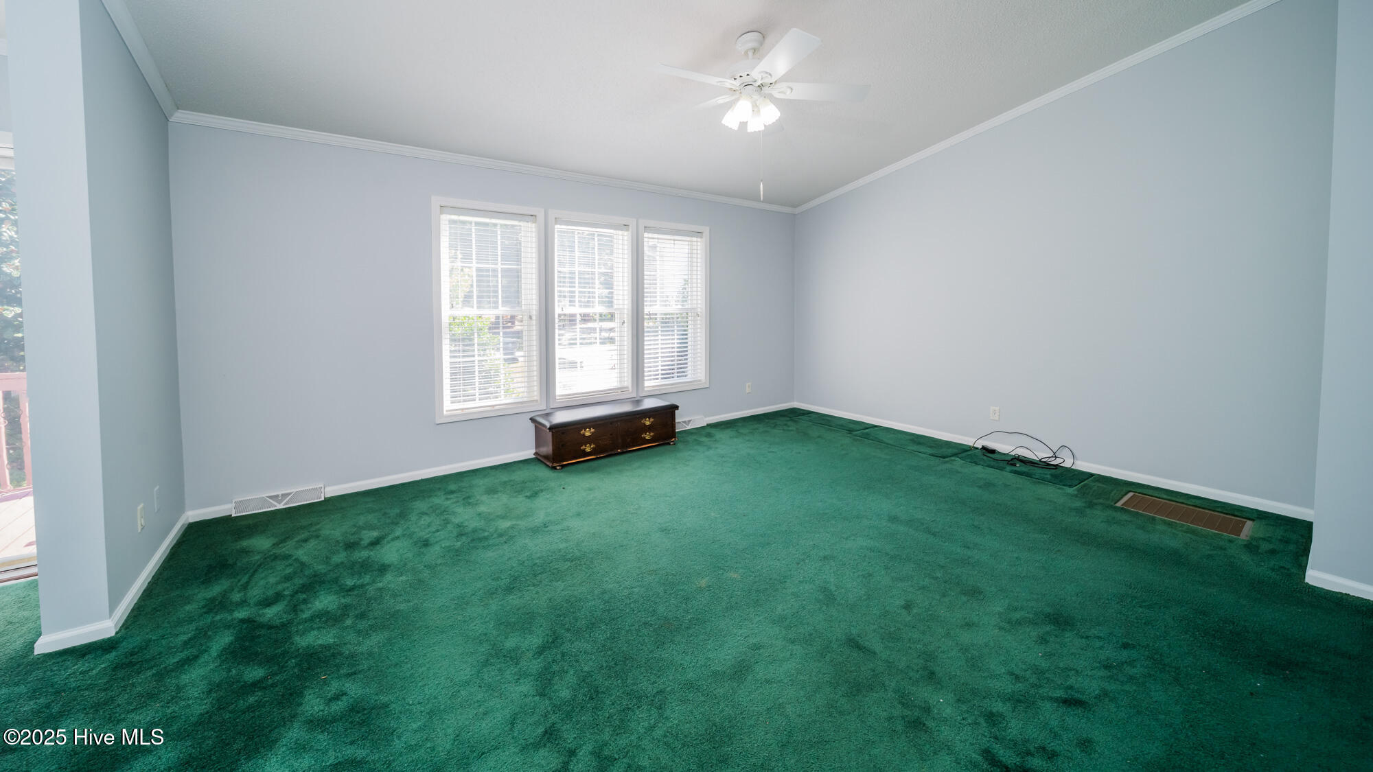 978 Palmer Drive Calabash, NC 28467 - Photo 6 of 30 The living room is a gracious size with loads of light