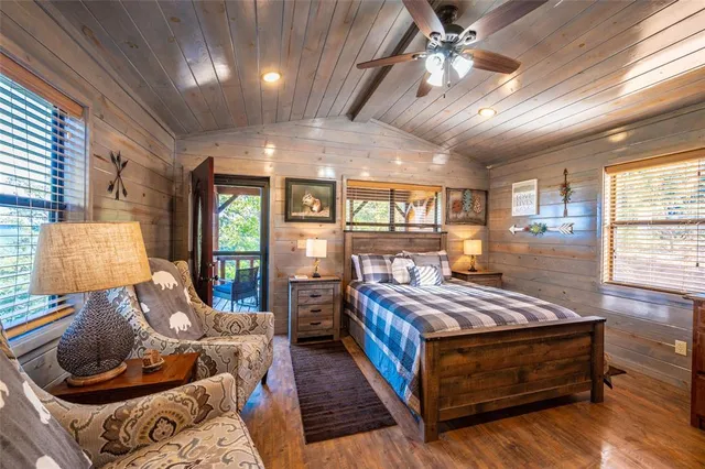 a bed room with a bed and window