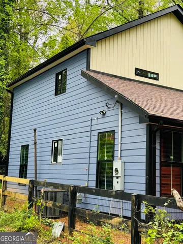 a view of a house with a patio