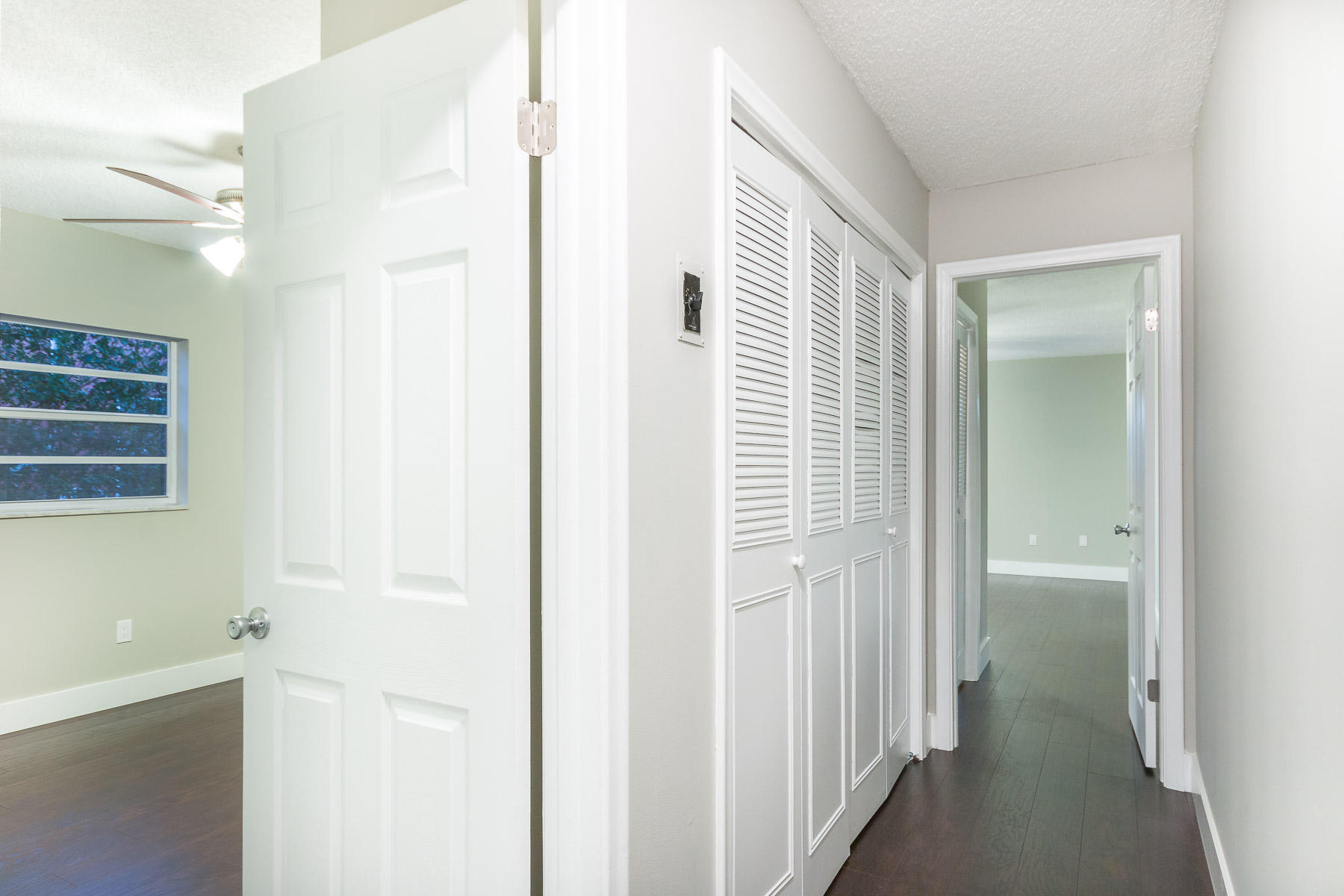 9222 Southwest 1st Place Boca Raton, FL 33428 - Photo 15 of 23 a view of a bathroom from a hallway