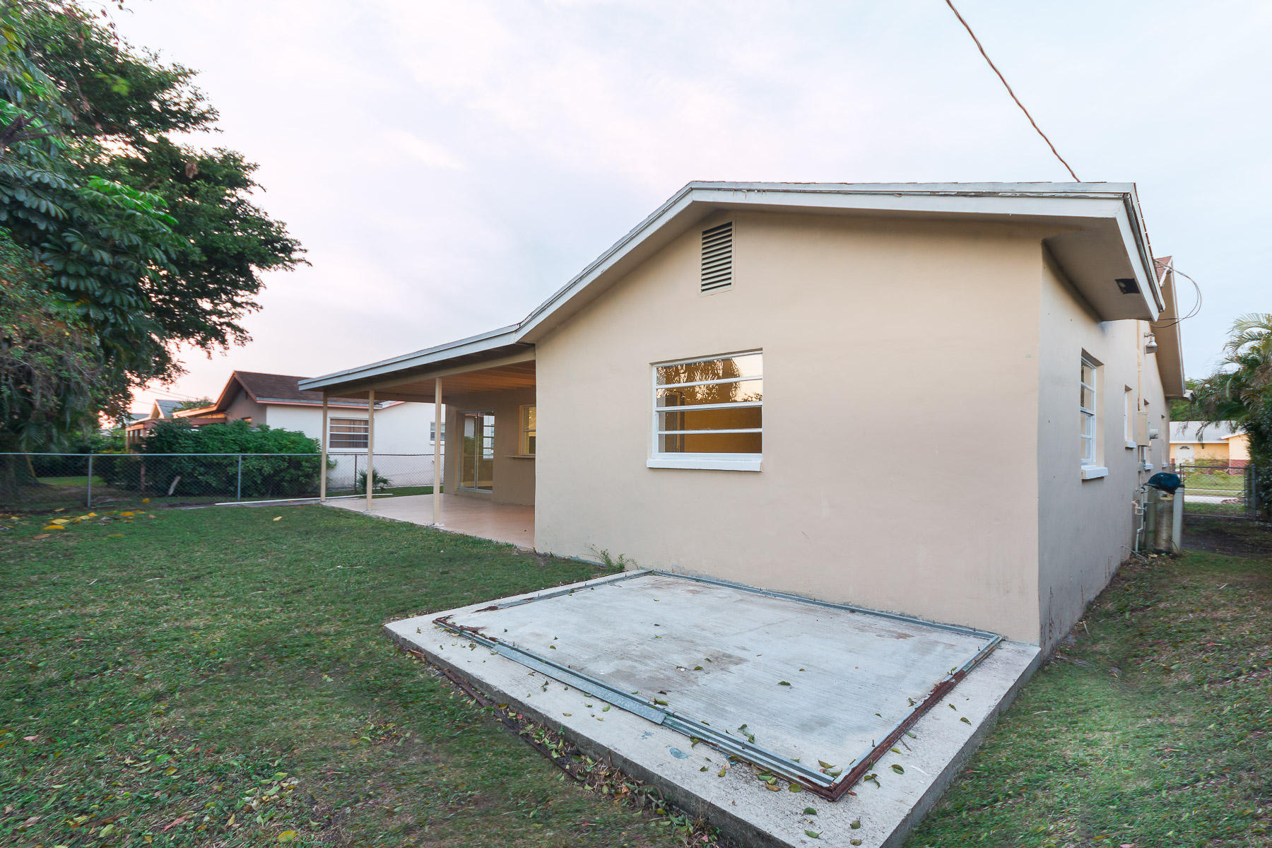 9222 Southwest 1st Place Boca Raton, FL 33428 - Photo 21 of 23 a view of a house with a backyard