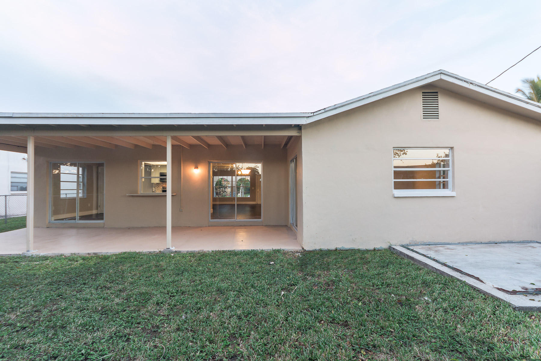 9222 Southwest 1st Place Boca Raton, FL 33428 - Photo 23 of 23 a view of a house with a backyard and porch